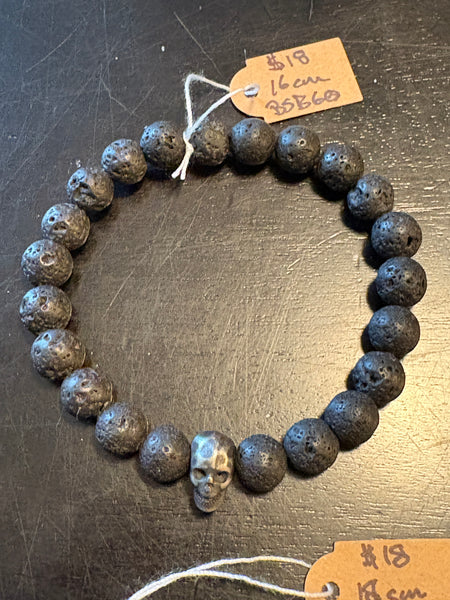 Cognac Baltic Amber w/ Lava & Skulls by Brent McMaster