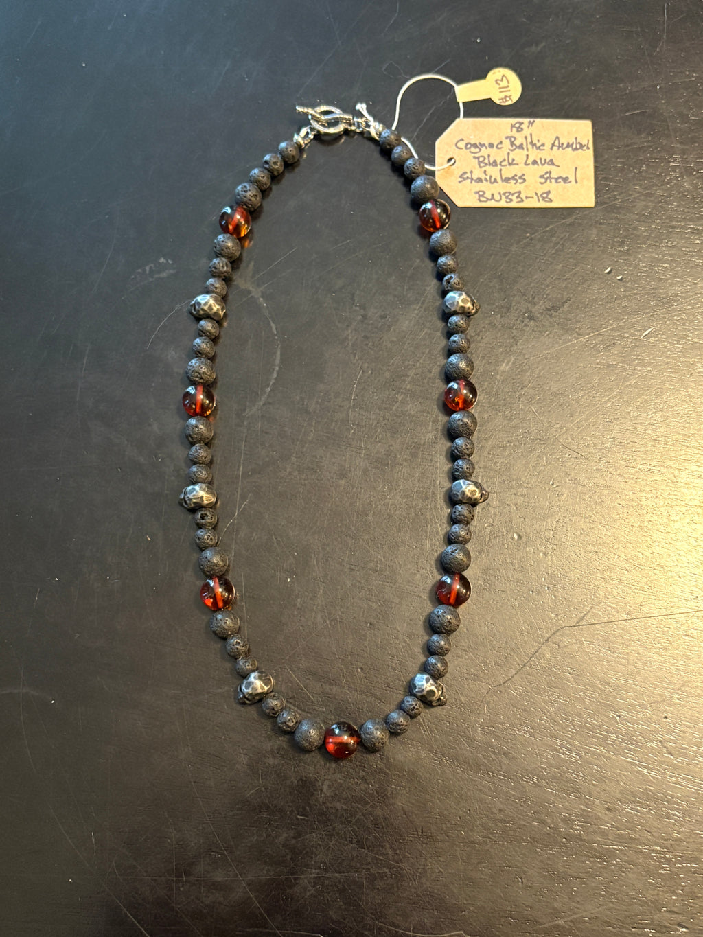 Cognac Baltic Amber w/ Lava & Skulls by Brent McMaster