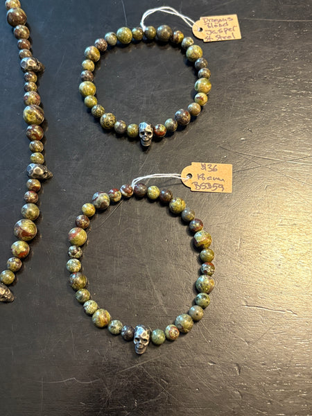 Dragons Blood Skulls by Brent McMaster