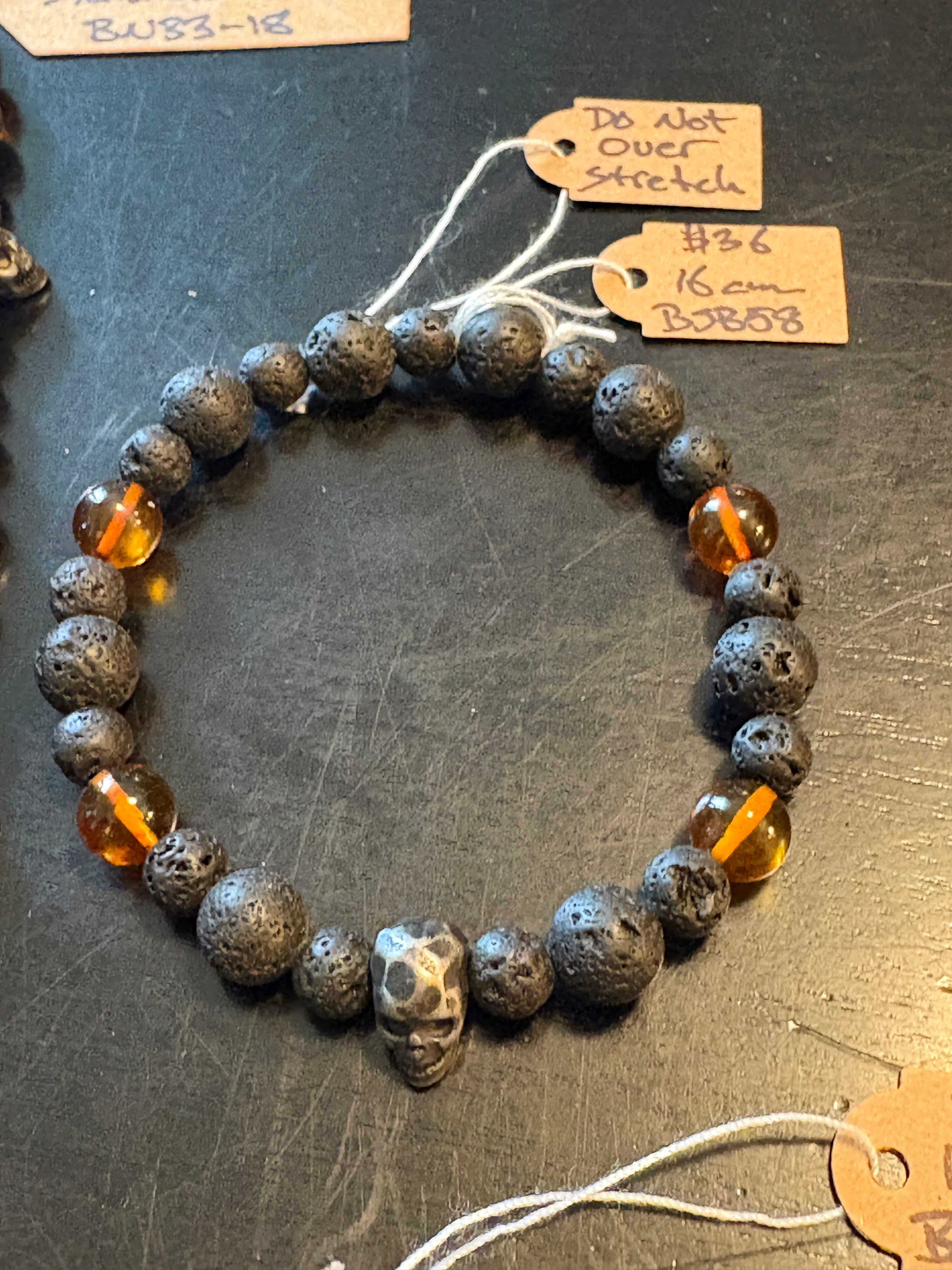 Cognac Baltic Amber w/ Lava & Skulls by Brent McMaster