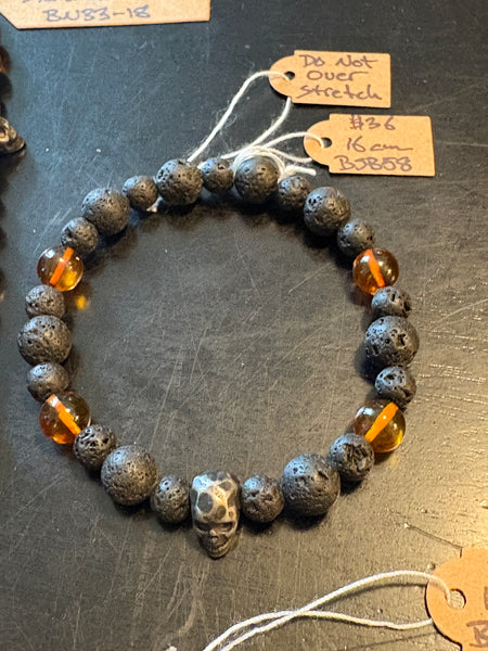 Cognac Baltic Amber w/ Lava & Skulls by Brent McMaster