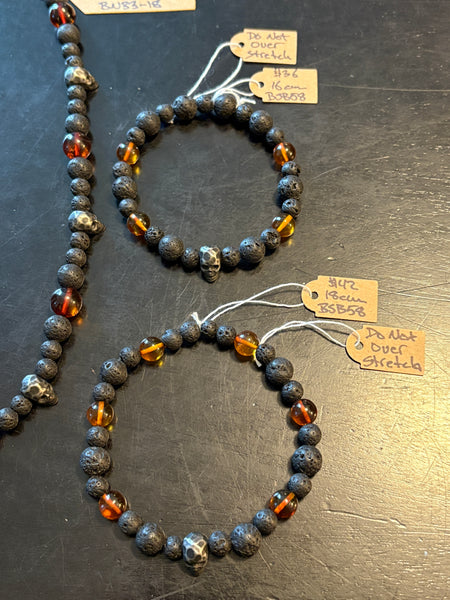 Cognac Baltic Amber w/ Lava & Skulls by Brent McMaster