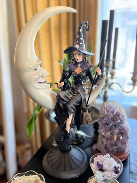 Witch Sitting on Crescent Moon