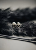 P + G Skull Studs Earrings
