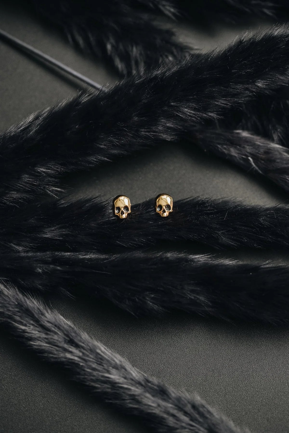 P + G Skull Studs Earrings
