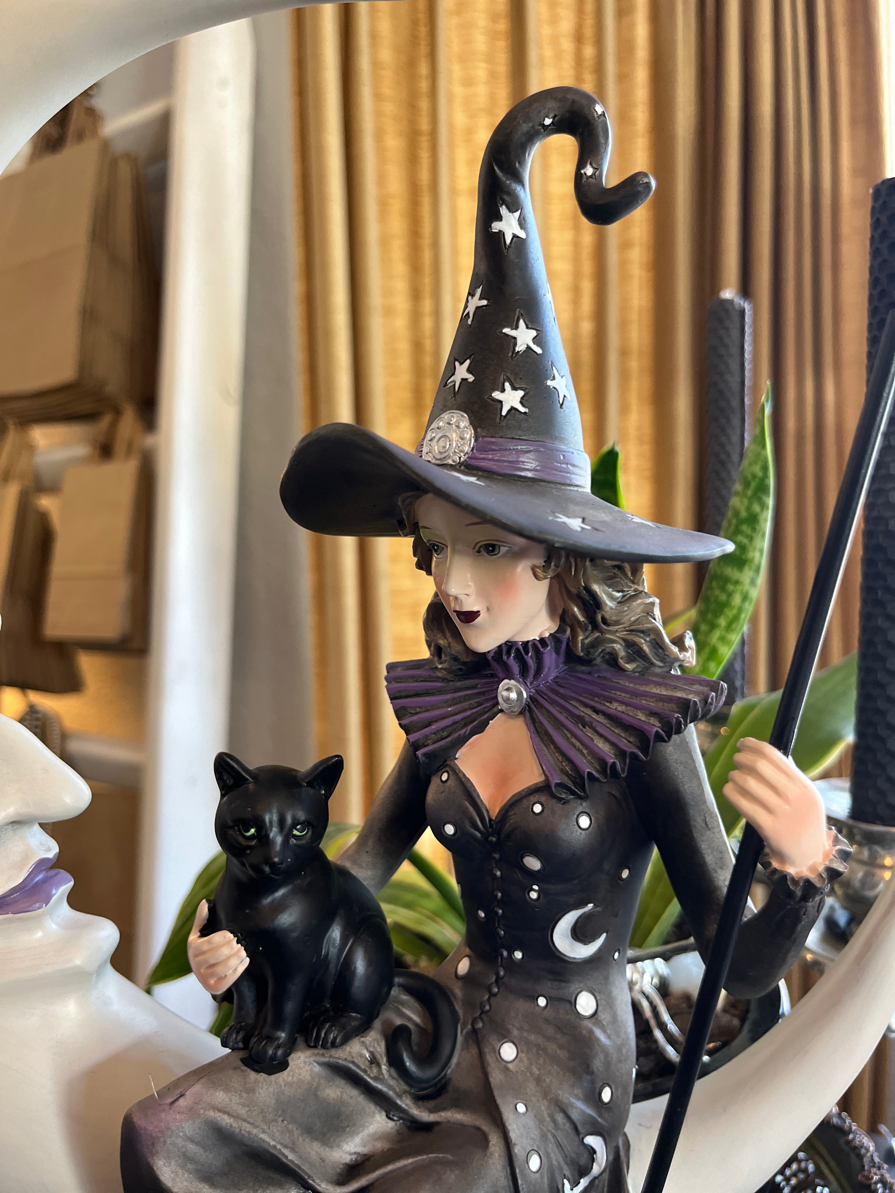 Witch Sitting on Crescent Moon