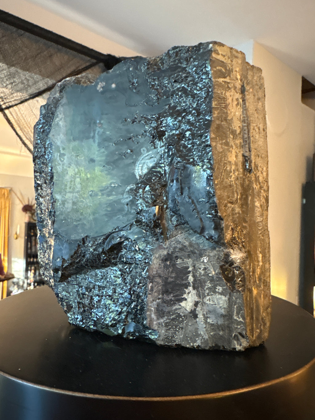 Black Tourmaline tower with rugged reflective surfaces