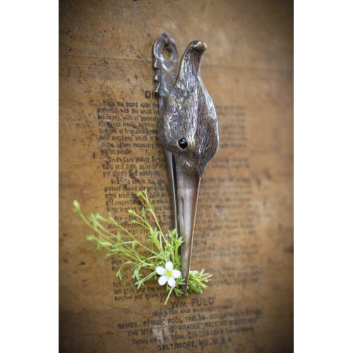 ANTIQUED BRASS STORK CLIP WITH JEWELED EYES
